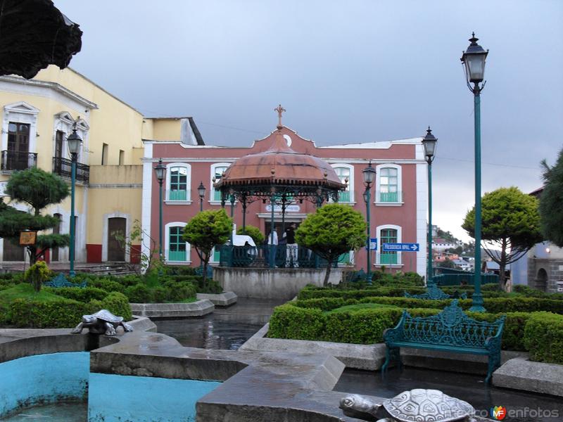 kiosko y lluvia