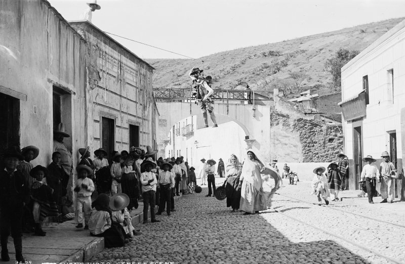 Celebración del Día de los Muertos (por William Henry Jackson, c. 1888)