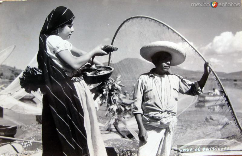 PESCADORES EN EL LAGO