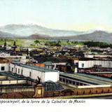 Vista del Iztaccíhuatl y el Popocatépetl desde una torre de la catedral